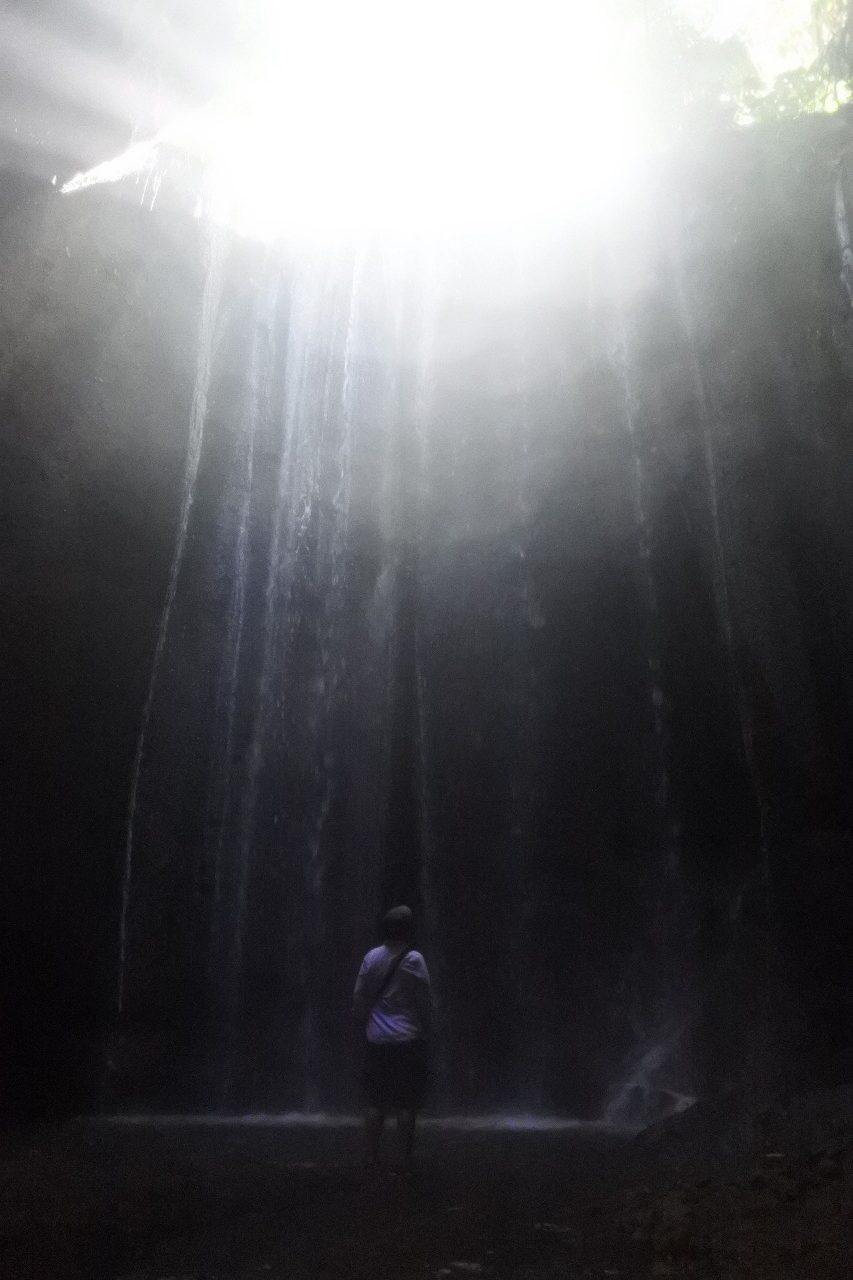 Light beam falling through the valley at the waterfall