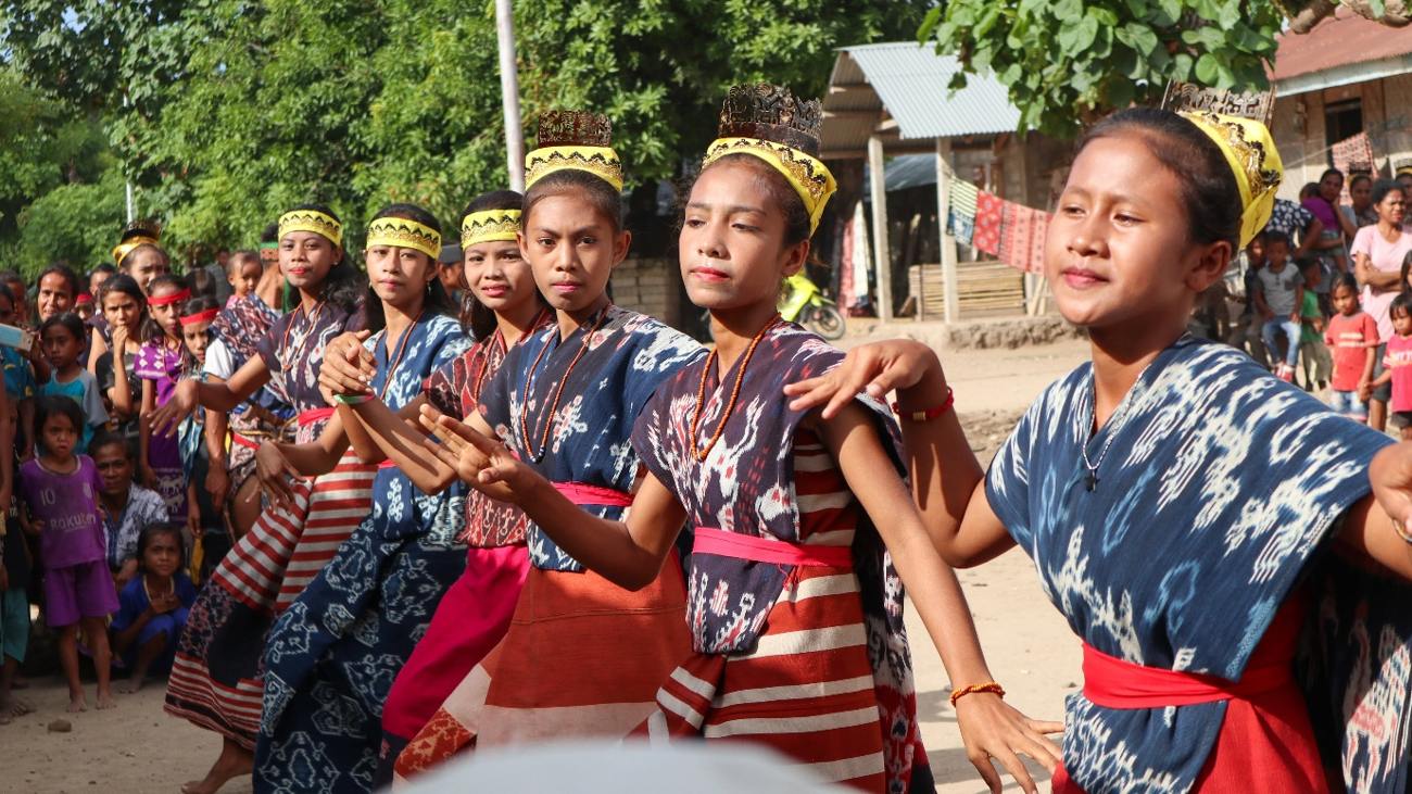 Young dancers in traditional ikat dress, Sumba