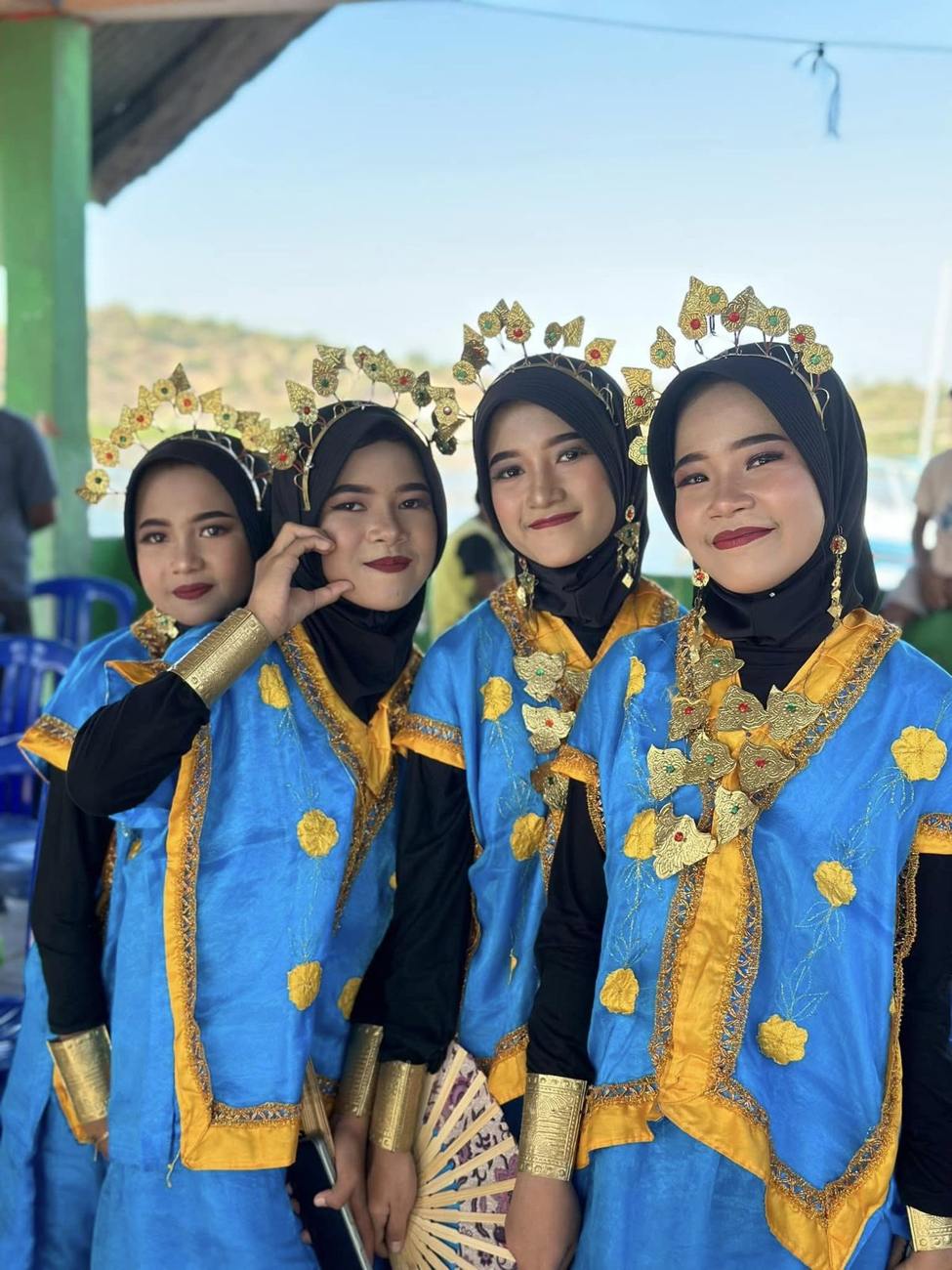 Three friends in traditional dress