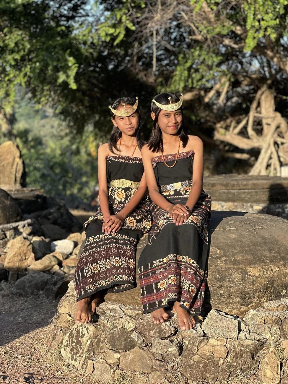 Two girls in ceremonial dress