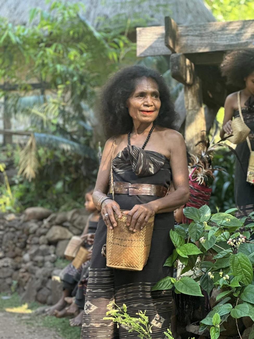 Village elder with a handwoven basket